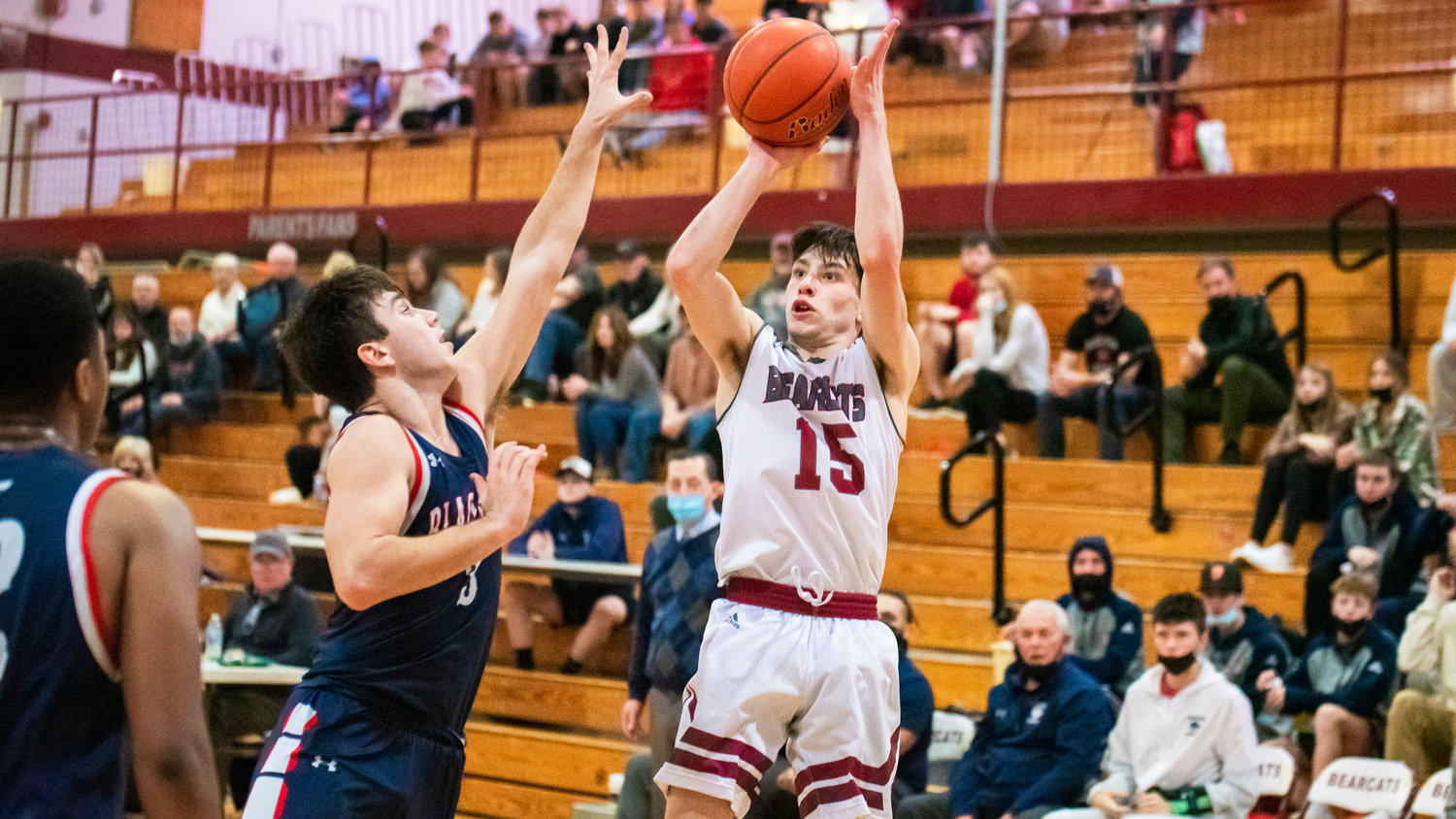 W.F. West’s Seth Hoff (15) looks to shoot over defenders Thursday night during a game.
